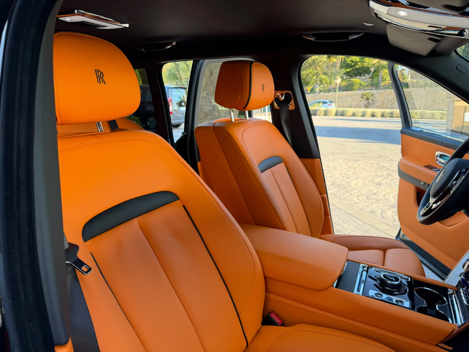 Orange front seats and driving position inside the Rolls-Royce Cullinan delivered to Eurostars Sitges